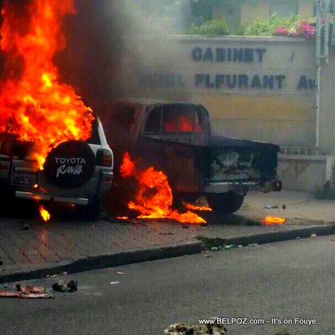 Manifestation in Cars on fire in front of Cabinet Aviol Fleurant