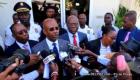 Haiti Prime Minister Jean Michel Lapin talks to the media while leaving the Parliament building
