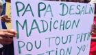 Haitian street protest sign ask our forefather Dessalines to curse all the sons and daughters of Petion