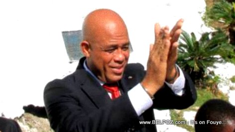 President Martelly Clapping his Hands
